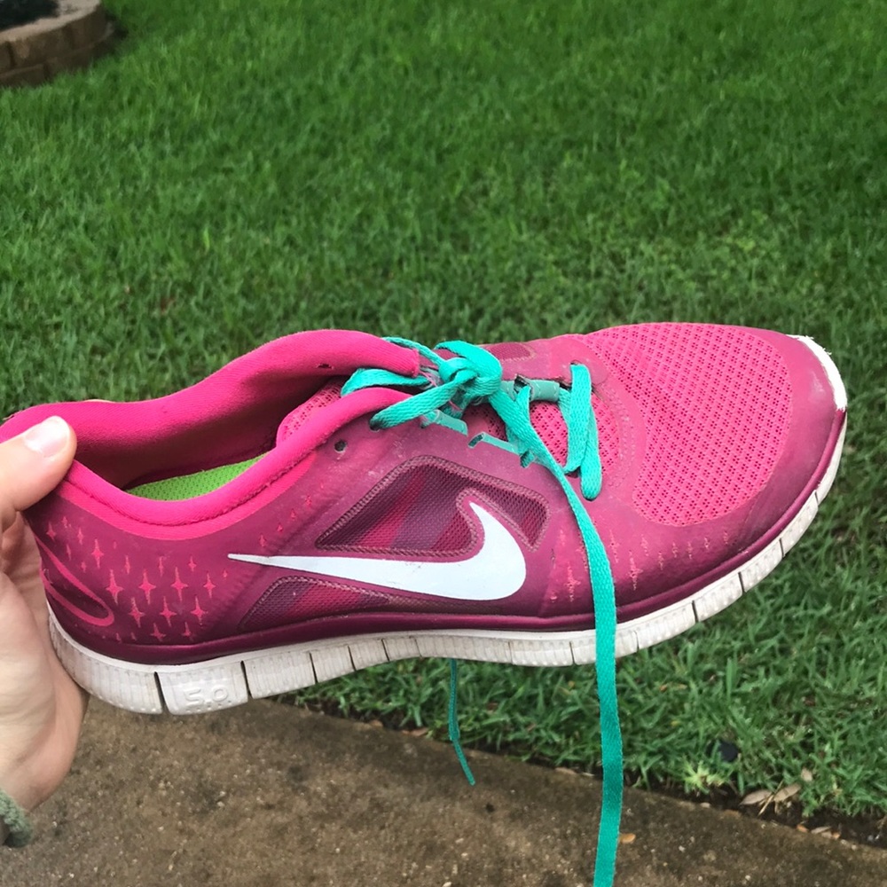 Pink Nike running shoes